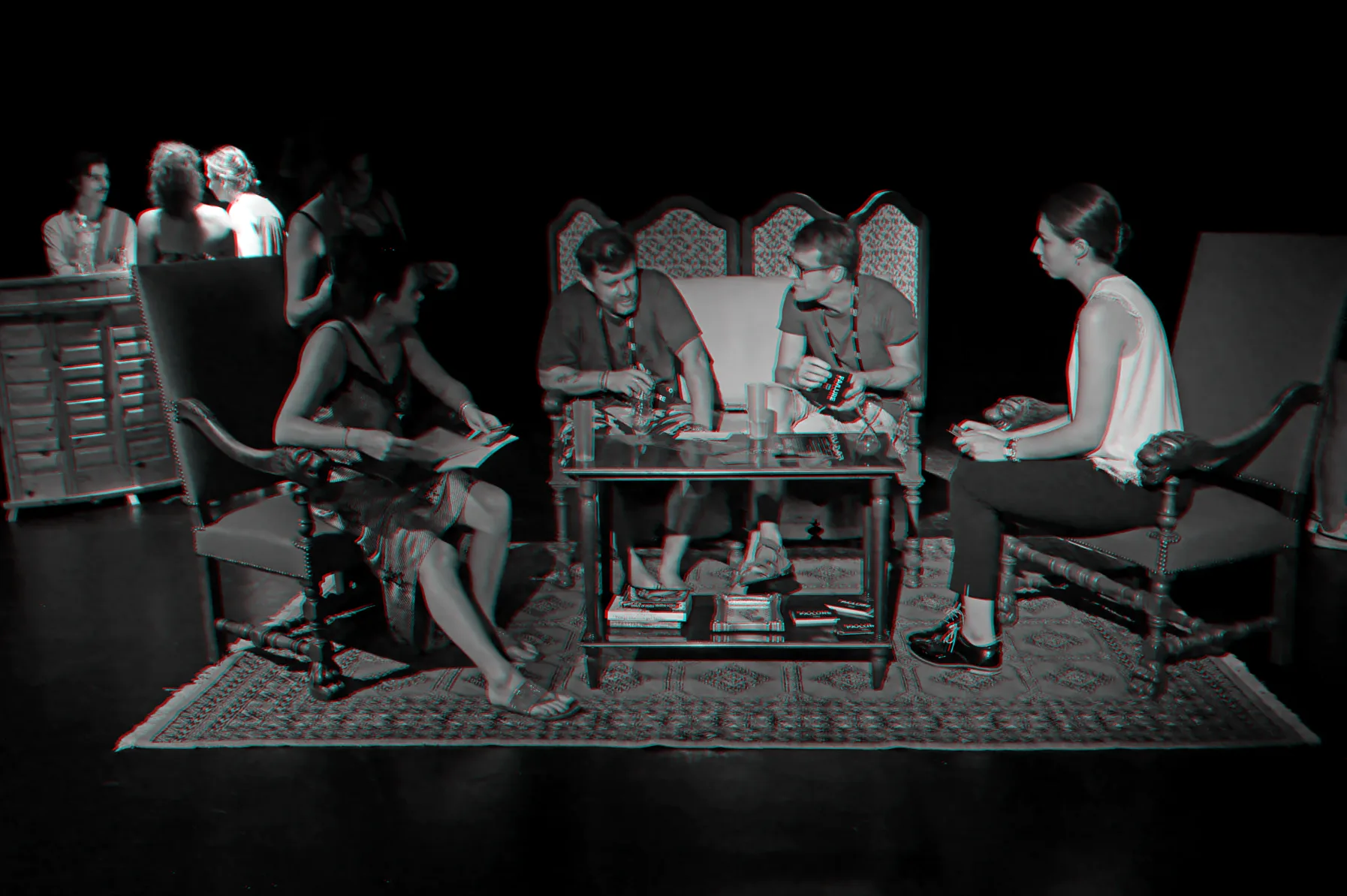 Participants in the living room of the house